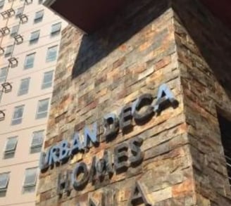 a tall building with a sign that says american eagle