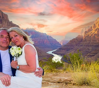 wedding couple at the grand canyon with the colorado river behind them