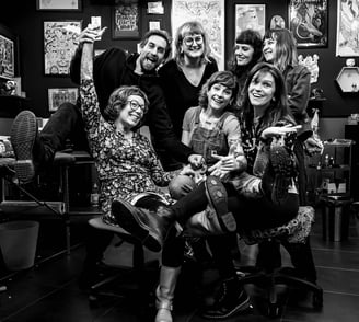 a group of people posing for a photo