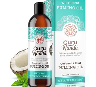a bottle of guacamoa oil with a box of coconut oil