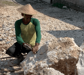 Workers are taking pieces of stone to make mosaics