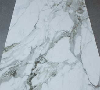 Classic Calacatta with striking vein details and a smooth, polished finish
