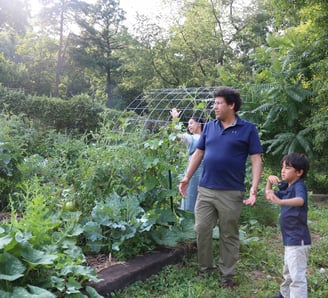 Dave and the kids in the garden. 