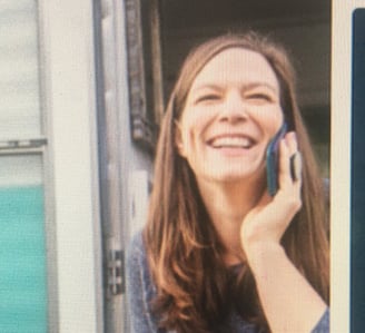 a woman talking on her cell phone phone