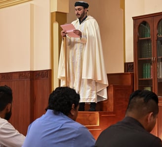 The Imam of Imam Malik Mosque delivering a Jutba