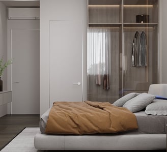 a bedroom with a bed and a television