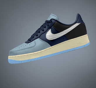 Free Nike Sneaker mockup showcasing left side view in navy, powder blue, and black color-block desig
