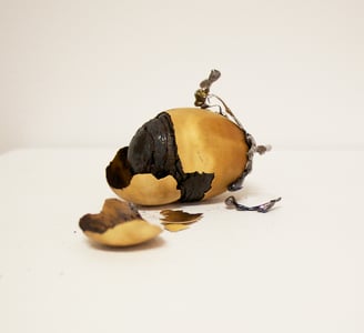 Jennifer Mae Wood, An Egg, Eggshell, lead, 2.5x1.5", 2015