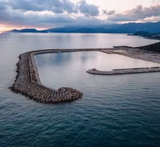 Outcropped encircling seawall