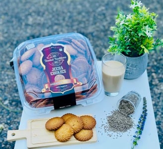 a container of cookies and a glass of tea, Jeera(Cumin) Cookies