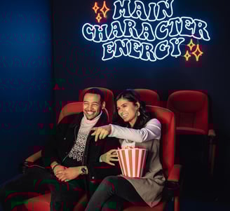 couples enjoying movie at home theatre setup