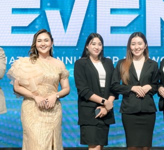 a group of people standing on a stage