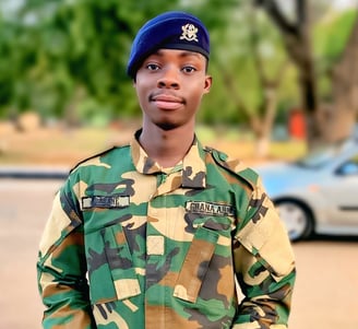 a man in a military uniform standing in front of a car