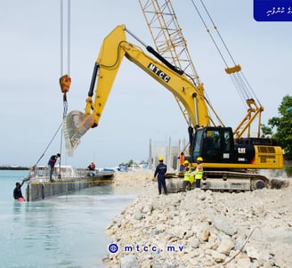 a crane is being lifted by a crane