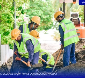 a group of people in safety vests and safety vests
