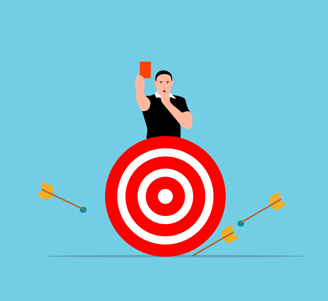 a man holding a phone while standing on a target