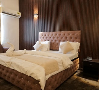 Super Executive Room at Hotel Kuber in Murthal featuring elegant design and premium comfort.