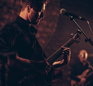 a man playing guitar