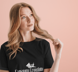 a woman wearing a black t - shirt with a custom logo on it