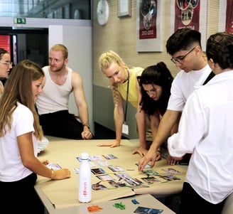 A group of students in Climate fresk workshop facilitated by Polona Hrovat Mavsar