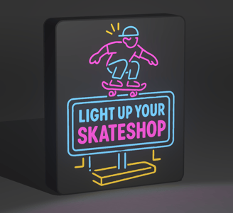 Close-up of a 3D-printed lightbox featuring a bold skate graphic and warm LED lighting.