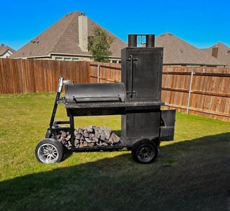 BBQ smoker with large smokestack for large events