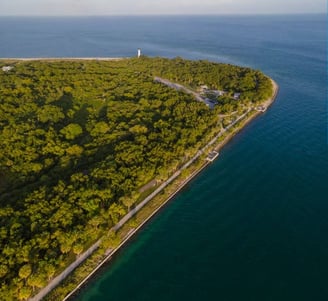 aerial view of seawall on peninsula