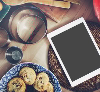 a tablet with a tablet and a tablet on a table
