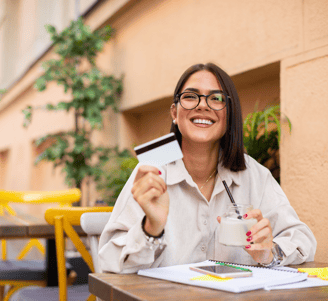 Students discussing campus credit card options for building credit in college