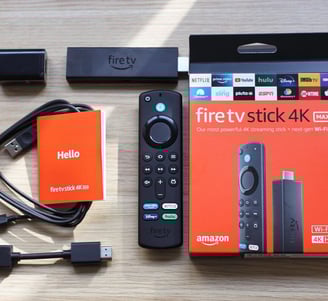 Amazon Fire TV Stick 4K Max package, including the Fire TV Stick, remote control, HDMI extender, power adapter, USB cable, an