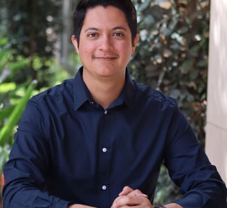 Jorge Duarte - a man in a blue shirt and a watch on his wrist