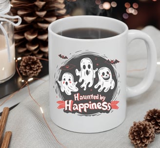 a cup of coffee with a ghost face on it