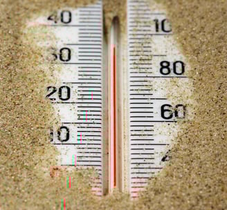 Thermometer in sand