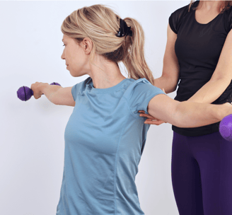 a woman is doing a back - to - back exercise