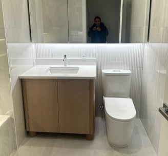 a bathroom with a toilet and a sink