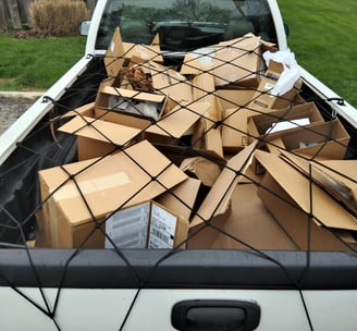 TRUCK SAFELY PACKED WITH CARDBOARD BOXES