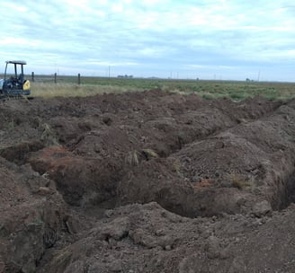 A drain field ditch before the gravelless pipe was installed at Hidden Garden RV Park in Lubbock, Tx