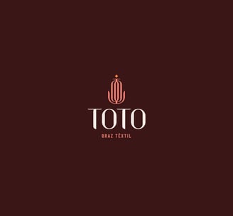 toto braz textile logo on a wine-colored background