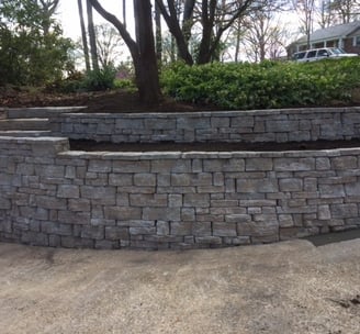 designed stamped concrete retaining wall Concrete Contractors Huntsville AL