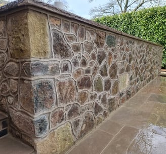 Malvern stone wall with raised pointing