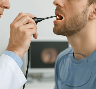 a doctor examining a patient's teeth
