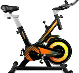 a stationary bike with a black and orange bike
