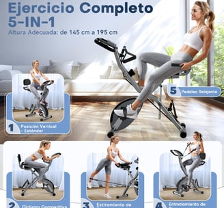 a woman is sitting on a stationary bike