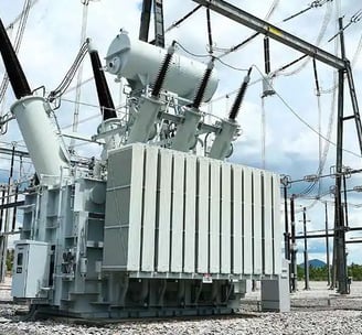 a large group of electrical equipment sitting on top of a pile of electrical equipment