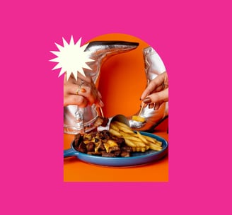 a person holding a plate with food on it