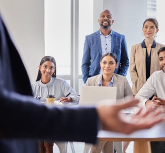 Professionals listening to a speaker