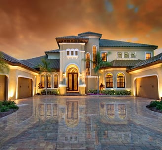 Large mansion with granite paved driveway in Texas