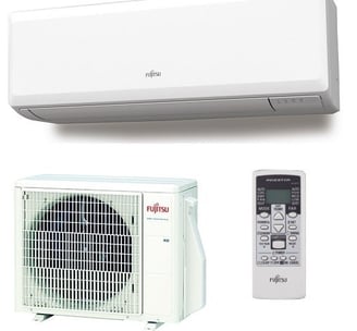 a white air conditioner with a remote control
