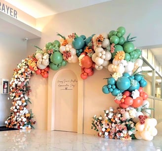 Balloon garland + floral package rental