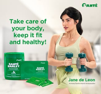 a woman in a green tank top and a pair of dumbs